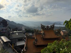 Looking down from jiufen to the ocean. Temple in the foreground