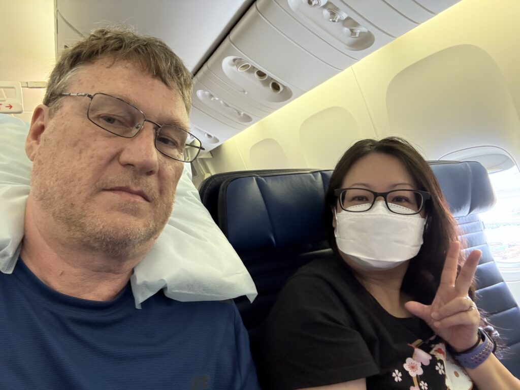 My wife and I on a plane.