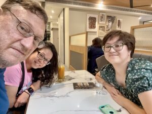 Three people at a table